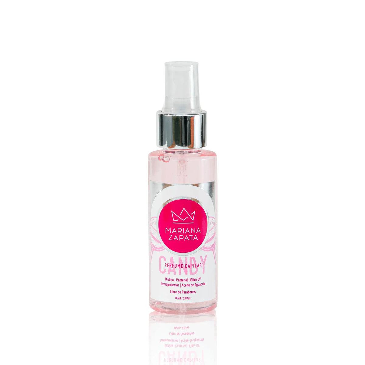 Perfume Capilar Candy, botella sobre fondo rosa – By Mariana Zapata