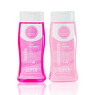 Kit Shampoo + Acondicionador, las dos botellas sobre fondo rosa – By Mariana Zapata