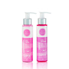 Kit Shampoo y Acondicionador tamaño viajero, las dos botellas sobre fondo rosa – By Mariana Zapata