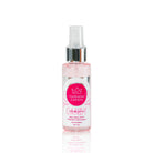 Perfume Capilar Candy, botella sobre fondo rosa – By Mariana Zapata